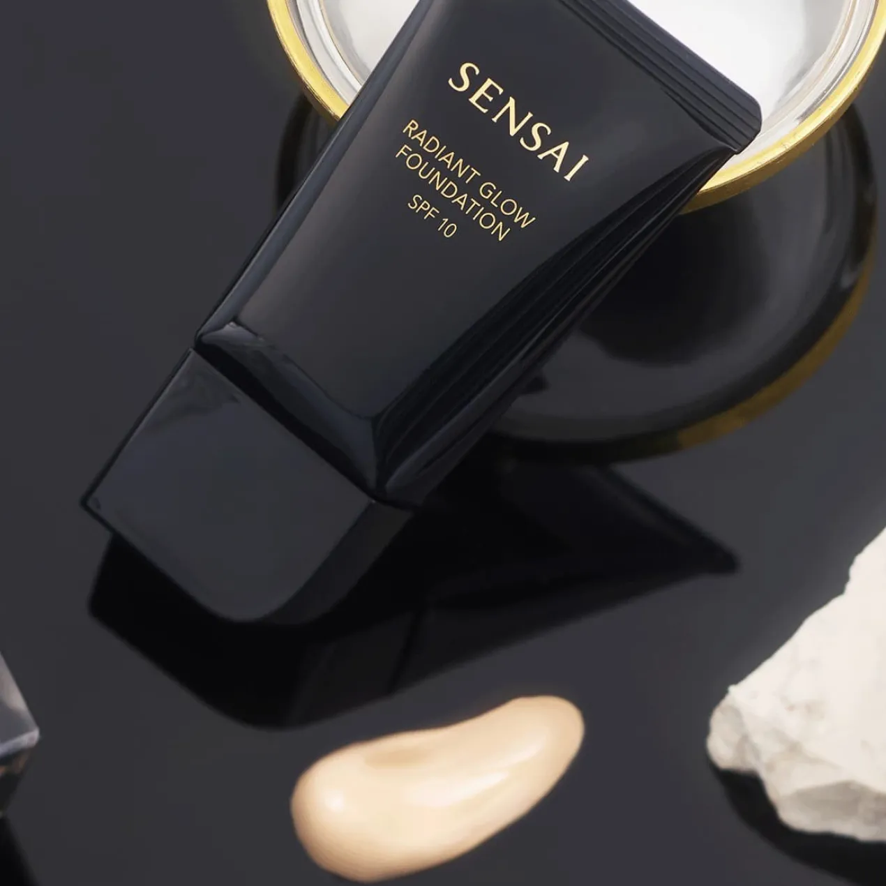 Base de Maquillaje Radiant Glow Foundation SPF10